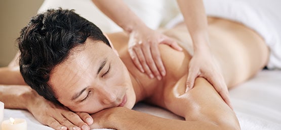Woman relaxing while she is enjoying her massage.
